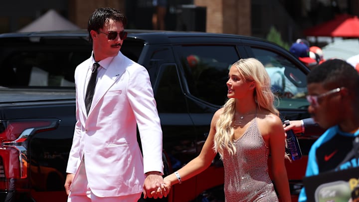Pittsburgh Pirates pitcher Paul Skenes walks the red carpet with LSU gymnast and girlfriend Livvy Dunne before the 2024 MLB All-Star game. Pittsburgh Pirates pitcher Paul Skenes walks the red carpet with LSU gymnast and girlfriend Livvy Dunne before the 2024 MLB All-Star game.