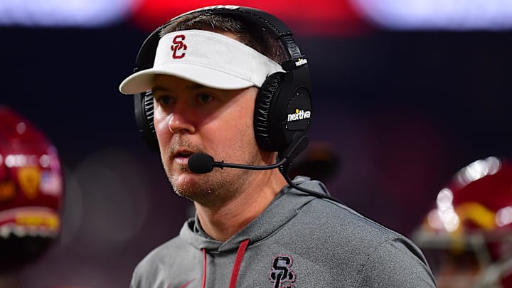 Dec 2, 2022; Las Vegas, NV, USA; Southern California Trojans head coach Lincoln Riley watches game action against the Utah Utes during the second half in the PAC-12 Football Championship at Allegiant Stadium. Mandatory Credit: Gary A. Vasquez-Imagn Images