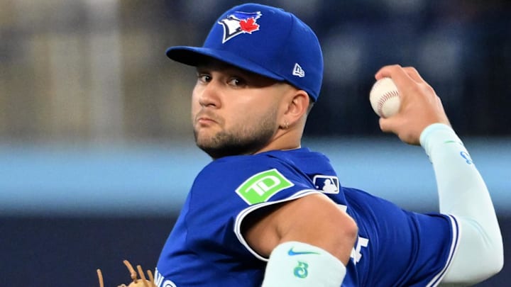 May 21, 2025; Toronto, Ontario, CAN;  Toronto Blue Jays shortstop Bo Bichette (11) warms up before playing the San Diego Padres at Rogers Centre. Mandatory Credit: Dan Hamilton-Imagn Images