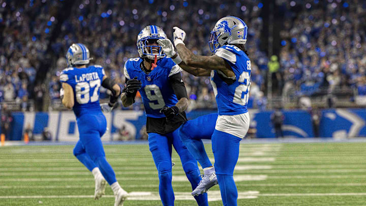 Detroit Lions running back Jahmyr Gibbs (26) celebrates a touchdown with wide receiver Jameson Williams (9)