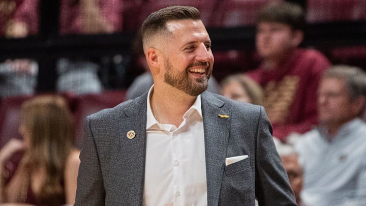 Florida State Seminoles head coach Luke Loucks smiles as his players celebrate. The Florida State Seminoles defeated the Alcorn State Braves 108-76 on Tuesday, Nov. 4, 2025. Florida State Seminoles head coach Luke Loucks smiles as his players celebrate. The Florida State Seminoles defeated the Alcorn State Braves 108-76 on Tuesday, Nov. 4, 2025.