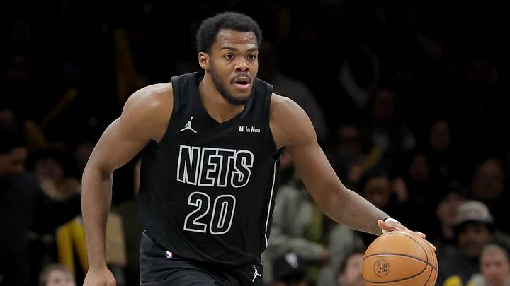 Feb 7, 2026; Brooklyn, New York, USA; Brooklyn Nets center Day'ron Sharpe (20) brings the ball up court against the Washington Wizards during the third quarter at Barclays Center. Mandatory Credit: Brad Penner-Imagn Images