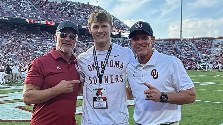 Oklahoma linebacker commit Jay Schell poses for a photo with Brian Bosworth and Brent Venables. Oklahoma linebacker commit Jay Schell poses for a photo with Brian Bosworth and Brent Venables.