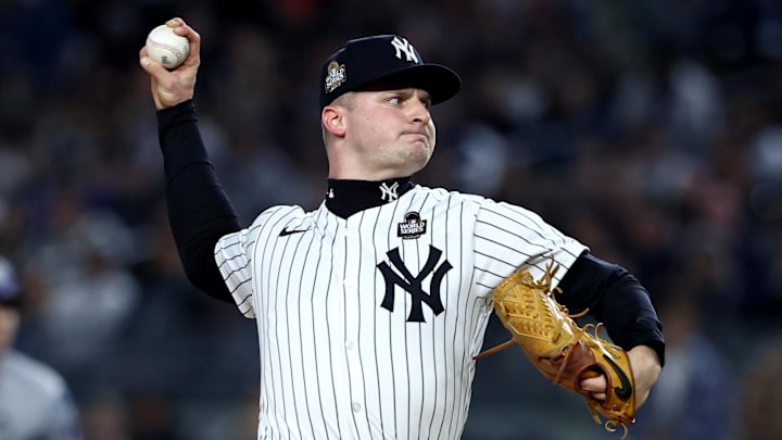 Oct 28, 2024; New York, New York, USA; New York Yankees pitcher Clarke Schmidt (36) throws during the first inning in game three of the 2024 MLB World Series against the Los Angeles Dodgers at Yankee Stadium.