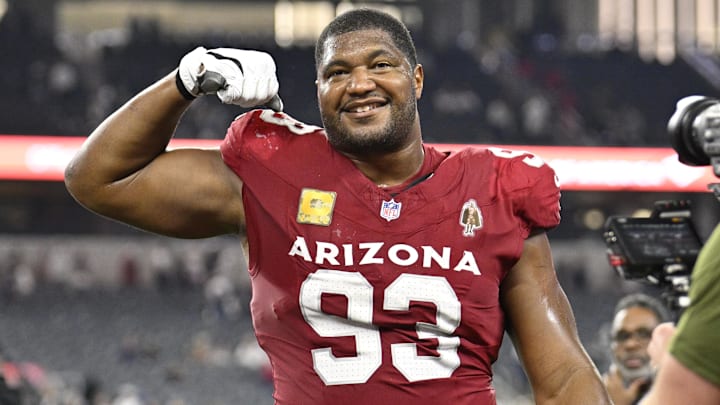 Arizona Cardinals defensive tackle Calais Campbell (93) celebrates as he leaves the field after defeating the Dallas Cowboys at AT&T Stadium.