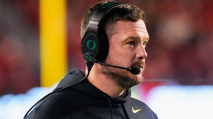 Nov 16, 2024; Madison, Wisconsin, USA; Oregon Ducks head coach Dan Lanning looks on during the first quarter against the Wisconsin Badgers at Camp Randall Stadium. Nov 16, 2024; Madison, Wisconsin, USA; Oregon Ducks head coach Dan Lanning looks on during the first quarter against the Wisconsin Badgers at Camp Randall Stadium.