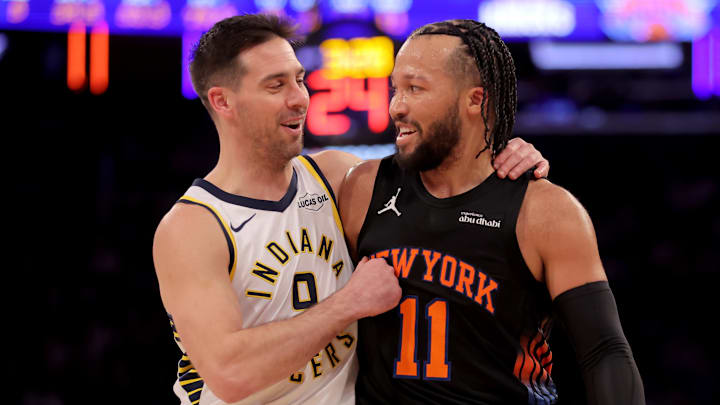 Feb 10, 2026; New York, New York, USA; Indiana Pacers guard T.J. McConnell (9) puts his arm around New York Knicks guard Jalen Brunson (11) during the third quarter at Madison Square Garden. Mandatory Credit: Brad Penner-Imagn Images