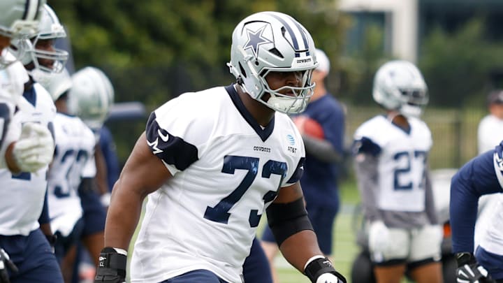 Dallas Cowboys guard Tyler Smith goes through a drill during practice at the Ford Center at the Star Training Facility