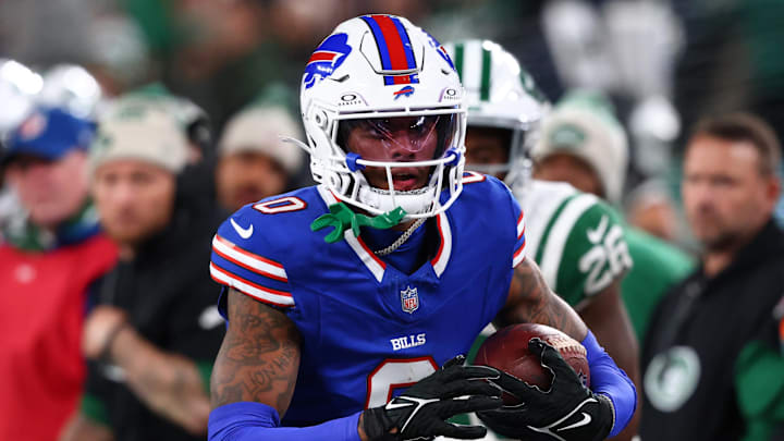 Oct 14, 2024; East Rutherford, New Jersey, USA; Buffalo Bills wide receiver Keon Coleman (0) runs with the ball against the New York Jets during the second half at MetLife Stadium. Mandatory Credit: Ed Mulholland-Imagn Images