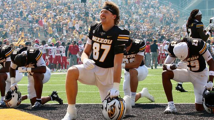 Sept 13, 2025; Columbia, Missouri, USA; Missouri Tigers tight end Brett Norfleet kneels in the end zone prior to Missouri's game against Louisiana at Faurot Field. Sept 13, 2025; Columbia, Missouri, USA; Missouri Tigers tight end Brett Norfleet kneels in the end zone prior to Missouri's game against Louisiana at Faurot Field.