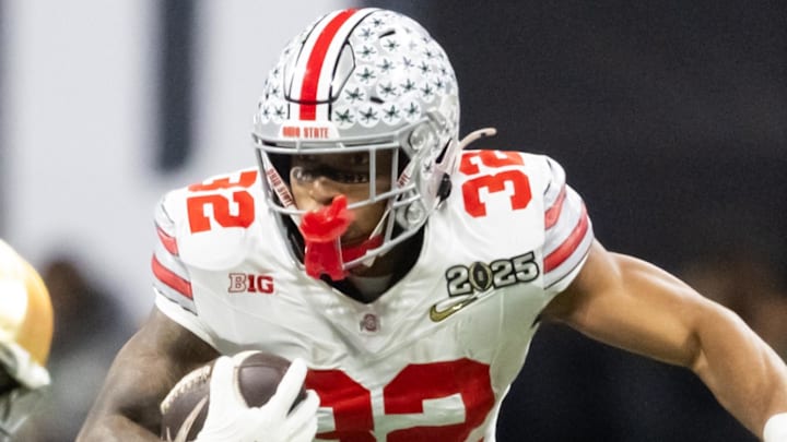 Jan 20, 2025; Atlanta, GA, USA; Ohio State Buckeyes running back TreVeyon Henderson (32) against the Notre Dame Fighting Irish during the CFP National Championship college football game at Mercedes-Benz Stadium. Mandatory Credit: Mark J. Rebilas-Imagn Images Jan 20, 2025; Atlanta, GA, USA; Ohio State Buckeyes running back TreVeyon Henderson (32) against the Notre Dame Fighting Irish during the CFP National Championship college football game at Mercedes-Benz Stadium. Mandatory Credit: Mark J. Rebilas-Imagn Images