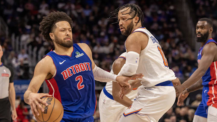 Apr 10, 2025; Detroit, Michigan, USA; New York Knicks guard Jalen Brunson (11) defends against Detroit Pistons guard Cade Cunningham (2) during the second half at Little Caesars Arena. Mandatory Credit: David Reginek-Imagn Images