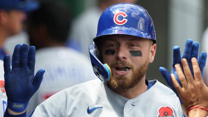 May 25, 2026; Pittsburgh, Pennsylvania, USA; Chicago Cubs first baseman Michael Busch (29) celebrates with teammates in the dugout after hitting a solo home run against Pittsburgh Pirates starting pitcher Carmen Mlodzinski (not pictured) during the fifth inning at PNC Park. Mandatory Credit: Charles LeClaire-Imagn Images