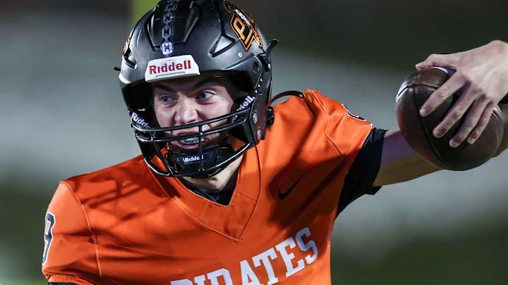 Platte County three-star senior quarterback Rocco Marriott scored a touchdown with 2 seconds remaining to help his No. 1 Pirates overcome No. 14 Rockhurst in a Class 5 District 8 thriller Friday night at Platte County High School.