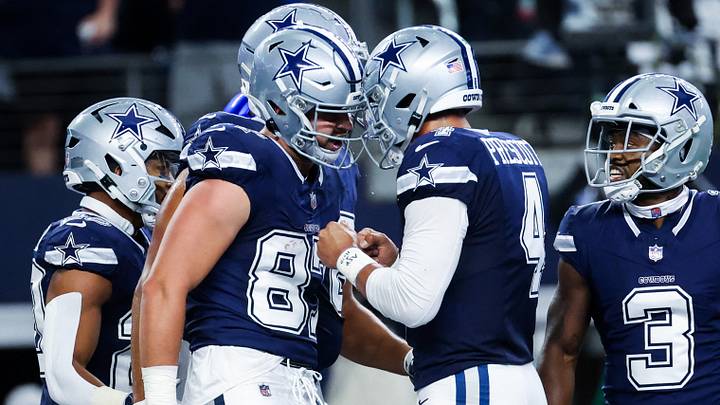 Dallas Cowboys tight end Jake Ferguson celebrates with Dak Prescott after catching a touchdown against the Los Angeles Rams at AT&T Stadium. Dallas Cowboys tight end Jake Ferguson celebrates with Dak Prescott after catching a touchdown against the Los Angeles Rams at AT&T Stadium.