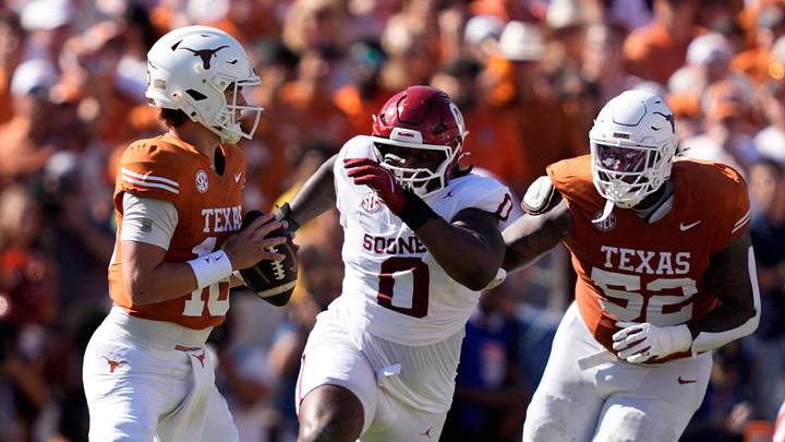 Texas quarterback Arch Manning (16) looks to throw against Oklahoma defensive tackle David Stone (0) in th 2025 game in Dallas. Texas quarterback Arch Manning (16) looks to throw against Oklahoma defensive tackle David Stone (0) in th 2025 game in Dallas.