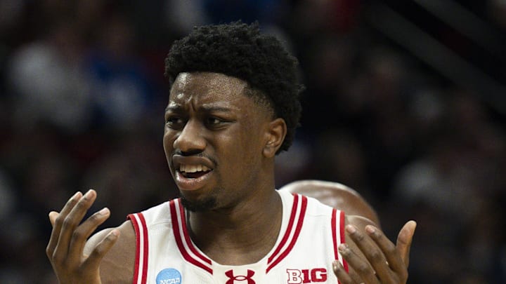 Mar 19, 2026; Portland, OR, USA; Wisconsin Badgers guard Braeden Carrington (0) and guard John Blackwell (25) react during the second half of a first round game of the men's 2026 NCAA Tournament against the High Point Panthers at Moda Center. Mandatory Credit: Troy Wayrynen-Imagn Images