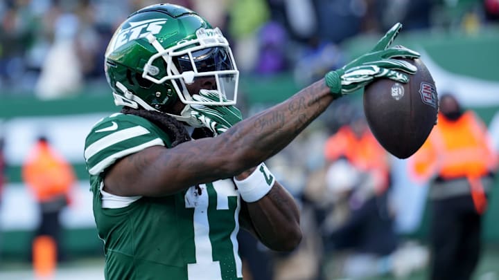 New York Jets receiver Davante Adams celebrates catching a pass.