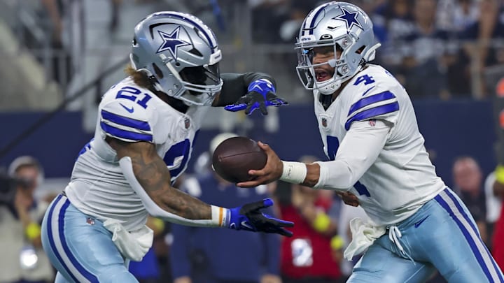 Dallas Cowboys QB Dak Prescott hands off to RB Ezekiel Elliott during the game against the Tampa Bay Buccaneers.