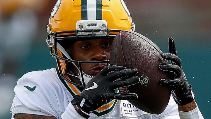 Green Bay Packers running back MarShawn Lloyd catches a toss during training camp. Green Bay Packers running back MarShawn Lloyd catches a toss during training camp.