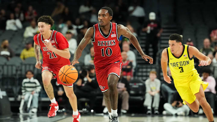 Nov 25, 2025; Las Vegas, Nevada, USA; San Diego State Aztecs guard BJ Davis (10) drives the ball in the second half against the Oregon Ducks.