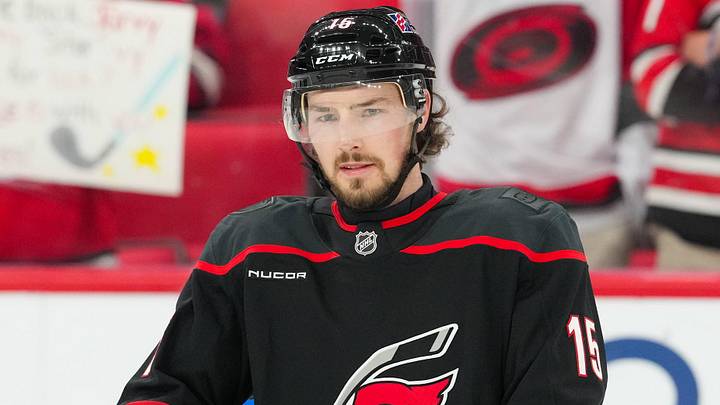 Jan 6, 2026; Raleigh, North Carolina, USA;  Carolina Hurricanes center Noah Philp (15) looks on during the warmups before the game against the Dallas Stars at Lenovo Center. Mandatory Credit: James Guillory-Imagn Images