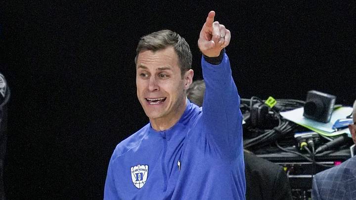 TCU Horned Frogs guard Brock Harding (2) passes near Duke Blue Devils head coach Jon Scheyer March 21, 2026 during the NCAA Men’s Basketball Tournament second round East Region game at the Bon Secours Wellness Arena in Greenville, South Carolina. TCU Horned Frogs guard Brock Harding (2) passes near Duke Blue Devils head coach Jon Scheyer March 21, 2026 during the NCAA Men’s Basketball Tournament second round East Region game at the Bon Secours Wellness Arena in Greenville, South Carolina.