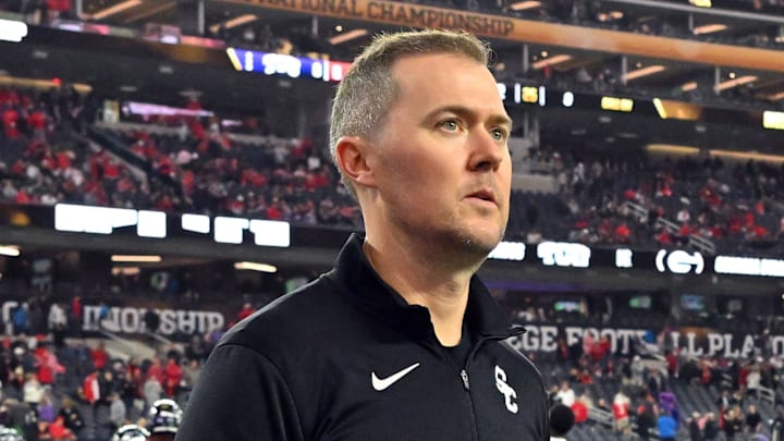 Jan 9, 2023; Inglewood, CA, USA; Southern California Trojans head coach Lincoln Riley walks the field before the CFP national championship game between the TCU Horned Frogs and the Georgia Bulldogs at SoFi Stadium. Mandatory Credit: Jayne Kamin-Oncea-Imagn Images Jan 9, 2023; Inglewood, CA, USA; Southern California Trojans head coach Lincoln Riley walks the field before the CFP national championship game between the TCU Horned Frogs and the Georgia Bulldogs at SoFi Stadium. Mandatory Credit: Jayne Kamin-Oncea-Imagn Images