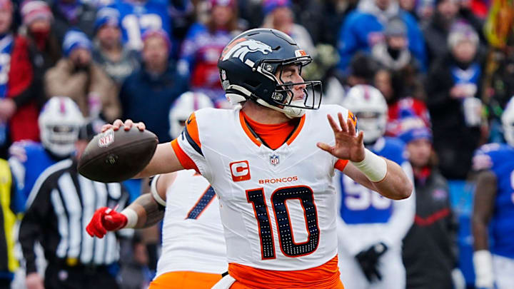 Denver Broncos quarterback Bo Nix (10) throws a. Pass during the first half of the Buffalo Bills wild card game against the Denver Broncos at Highmark Stadium in Orchard Park on Jan. 12, 2025.