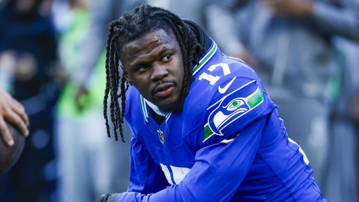 Oct 10, 2024; Seattle, Washington, USA; Seattle Seahawks linebacker Jerome Baker (17) takes a break during pregame warmups against the San Francisco 49ers at Lumen Field. Mandatory Credit: Joe Nicholson-Imagn Images
