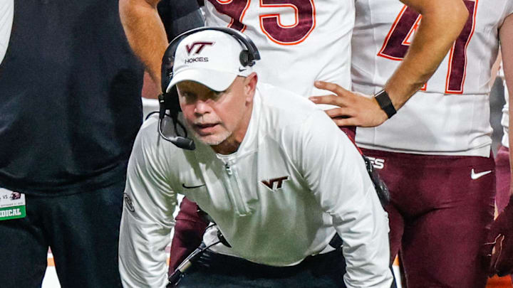 Sep 27, 2025; Raleigh, North Carolina, USA; Virginia Tech Hokies interim head coach Philip Montgomery shouts to his team during the first half of the game against North Carolina State Wolfpack at Carter-Finley Stadium. Mandatory Credit: Jaylynn Nash-Imagn Images