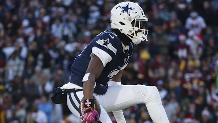 Dallas Cowboys wide receiver George Pickens celebrates after a play against the Washington Commanders.