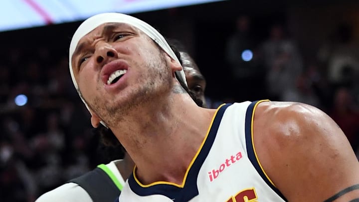 Apr 18, 2026; Denver, Colorado, USA; Denver Nuggets forward Aaron Gordon (32) celebrates after a dunk during the second half against the Minnesota Timberwolves in game one of the first round of the 2026 NBA Playoffs at Ball Arena. Mandatory Credit: Christopher Hanewinckel-Imagn Images