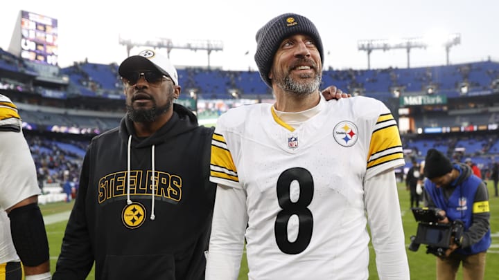 Dec 7, 2025; Baltimore, Maryland, USA; Pittsburgh Steelers head coach Mike Tomlin and quarterback Aaron Rodgers (8) walk off the field after the game against the Baltimore Ravens at M&T Bank Stadium. Mandatory Credit: Peter Casey-Imagn Images