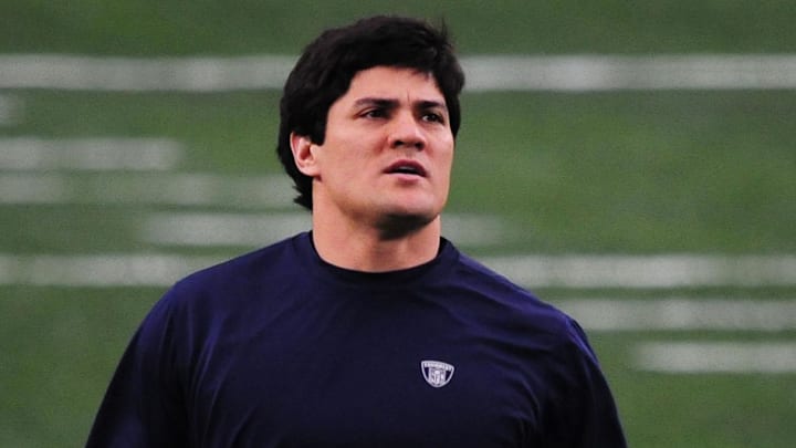 Feb 3, 2008; Glendale, AZ, USA;New England Patriots linebacker Tedy Bruschi walks on the field before the start of Super Bowl XLII against the New York Giants at the University of Phoenix Stadium.  Mandatory Credit: Mark J. Rebilas-Imagn Images