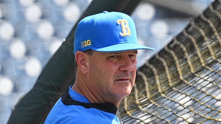 Jun 14, 2025; Omaha, Neb, USA; UCLA Bruins head coach John Savage watches the team warm up before the game against the Murray State Races at Charles Schwab Field. Mandatory Credit: Steven Branscombe-Imagn Images Jun 14, 2025; Omaha, Neb, USA; UCLA Bruins head coach John Savage watches the team warm up before the game against the Murray State Races at Charles Schwab Field. Mandatory Credit: Steven Branscombe-Imagn Images