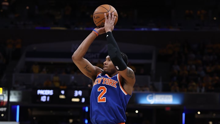 May 27, 2025; Indianapolis, Indiana, USA; New York Knicks guard Miles McBride (2) shoots a three point basket during the third quarter against the Indiana Pacers during game four of the eastern conference finals for the 2025 NBA Playoffs at Gainbridge Fieldhouse. Mandatory Credit: Trevor Ruszkowski-Imagn Images