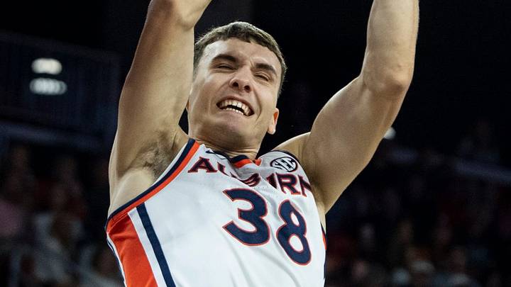 Auburn Tigers forward Filip Jović (38) dunks the ball as Auburn Tigers take on Jackson State Tigers at Neville Arena in Auburn, Ala. on Wednesday, Nov. 19, 2025. Auburn Tigers defeated Jackson State Tigers 112-66.