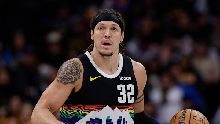 Jan 17, 2026; Denver, Colorado, USA; Denver Nuggets forward Aaron Gordon (32) dribbles the ball up court in the first quarter against the Washington Wizards at Ball Arena.