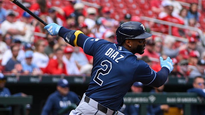 Mar 29, 2026; St. Louis, Missouri, USA; Tampa Bay Rays designated hitter Yandy Díaz (2) hits a one run single against the St. Louis Cardinals during the second inning at Busch Stadium.