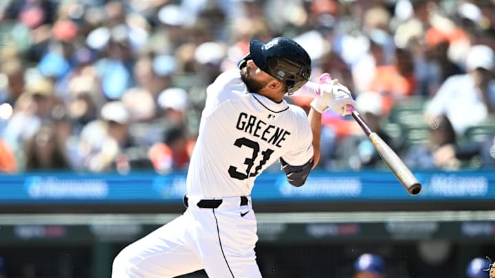 May 11, 2025; Detroit, Michigan, USA; Detroit Tigers left fielder Riley Greene (31) hits a double against the Texas Rangers in the third inning at Comerica Park. 