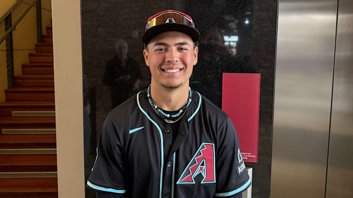 Arizona Diamondbacks infield prospect Demetrio Crisantes poses for a picture prior to the Spring Breakout game against the Kansas City Royals prospect at Salt River Fields, March 14, 2025