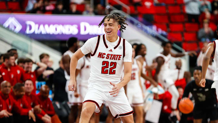 Nov 22, 2024; Raleigh, North Carolina, USA; North Carolina State Wolfpack guard Jordan Snell (22) celebrates during the second half of the game against the William & Mary Tribe at Lenovo Center. Mandatory Credit: Jaylynn Nash-Imagn Images Nov 22, 2024; Raleigh, North Carolina, USA; North Carolina State Wolfpack guard Jordan Snell (22) celebrates during the second half of the game against the William & Mary Tribe at Lenovo Center. Mandatory Credit: Jaylynn Nash-Imagn Images