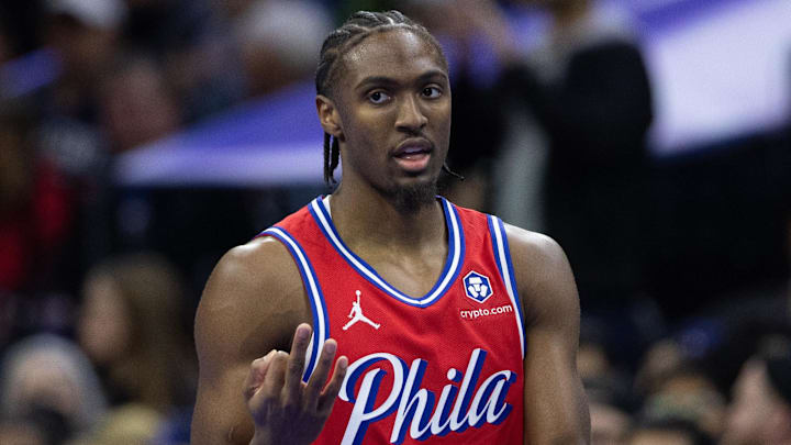 Nov 22, 2024; Philadelphia, Pennsylvania, USA; Philadelphia 76ers guard Tyrese Maxey (0) reacts to  his three pointer against the Brooklyn Nets during the first quarter at Wells Fargo Center. Mandatory Credit: Bill Streicher-Imagn Images