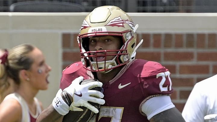 Sep 6, 2025; Tallahassee, Florida, USA; Florida State Seminoles running back Gavin Sawchuck (27) runs down the sideline for a touchdown during the second half against the East Texas A&M Lions at Doak S. Campbell Stadium. Mandatory Credit: Melina Myers-Imagn Images