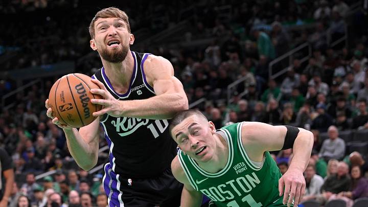 Apr 5, 2024; Boston, Massachusetts, USA; Sacramento Kings forward Domantas Sabonis (10) elbows Boston Celtics guard Payton Pritchard (11) while shooting during the second half at TD Garden. Mandatory Credit: Eric Canha-Imagn Images Apr 5, 2024; Boston, Massachusetts, USA; Sacramento Kings forward Domantas Sabonis (10) elbows Boston Celtics guard Payton Pritchard (11) while shooting during the second half at TD Garden. Mandatory Credit: Eric Canha-Imagn Images