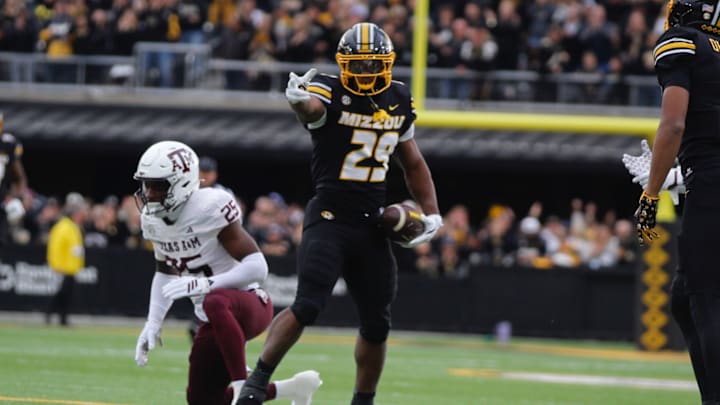 Nov 8, 2025; Columbia, Missouri, USA; Missouri Tigers running back Ahmad Hardy celebrates a rush in the Missouri matchup against Texas A&M at Faurot Field.