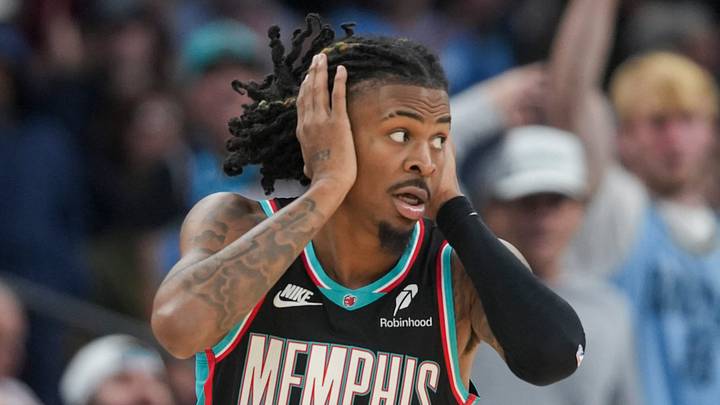 Grizzlies' Ja Morant (12) reacts after making a 3-pointer during the home opener against the New Orleans Pelicans at FedExForum on October 22, 2025. Grizzlies' Ja Morant (12) reacts after making a 3-pointer during the home opener against the New Orleans Pelicans at FedExForum on October 22, 2025.
