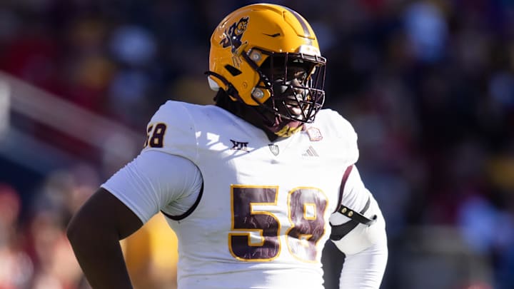 Nov 30, 2024; Tucson, Arizona, USA; Arizona State Sun Devils offensive lineman Max Iheanachor (58) against the Arizona Wildcats during the Territorial Cup at Arizona Stadium. Mandatory Credit: Mark J. Rebilas-Imagn Images