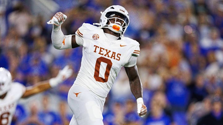 Texas Longhorns linebacker Anthony Hill Jr. (0) celebrates after the Kentucky Wildcats fail to score in overtime at Kroger Field.